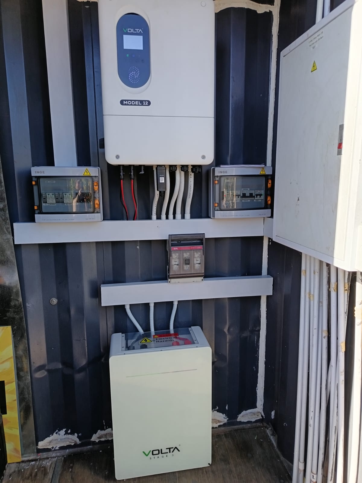 Volta Model 12 inverter with Stage 3 lithium battery — container installation