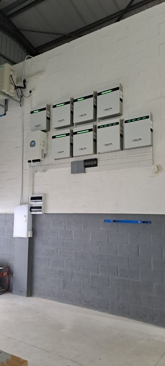 Volta battery bank with hybrid inverter — residential installation